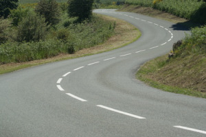 Quelle procédure pour réduire une marge de retrait le long d'une route ?